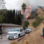 A second wind whipped wildfire is burning out of control in the los angeles area prompting more evacuation orders