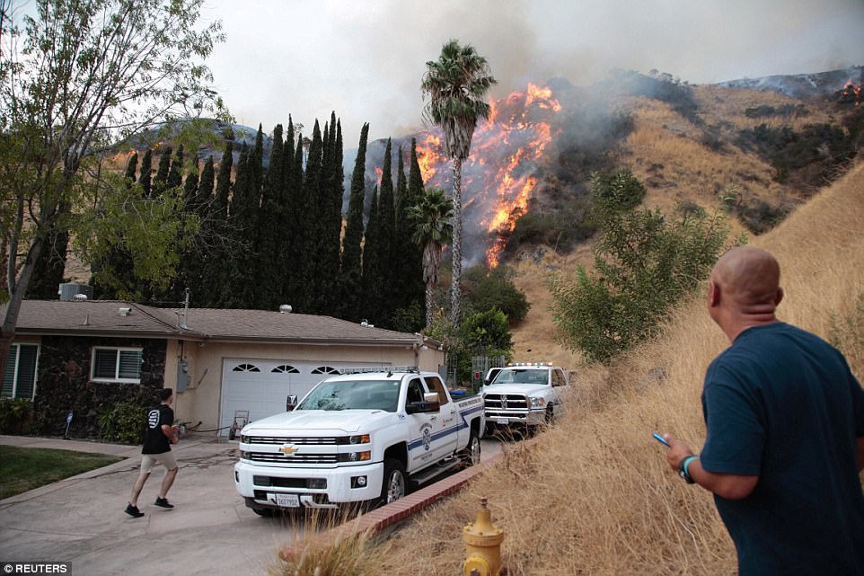 A second wind whipped wildfire is burning out of control in the los angeles area prompting more evacuation orders