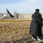 South korea struggles to determine cause of plane crash that killed 179 people
