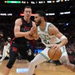 Jayson tatum scores 33 celtics hold heat to 34 shooting and roll to 103 85 win
